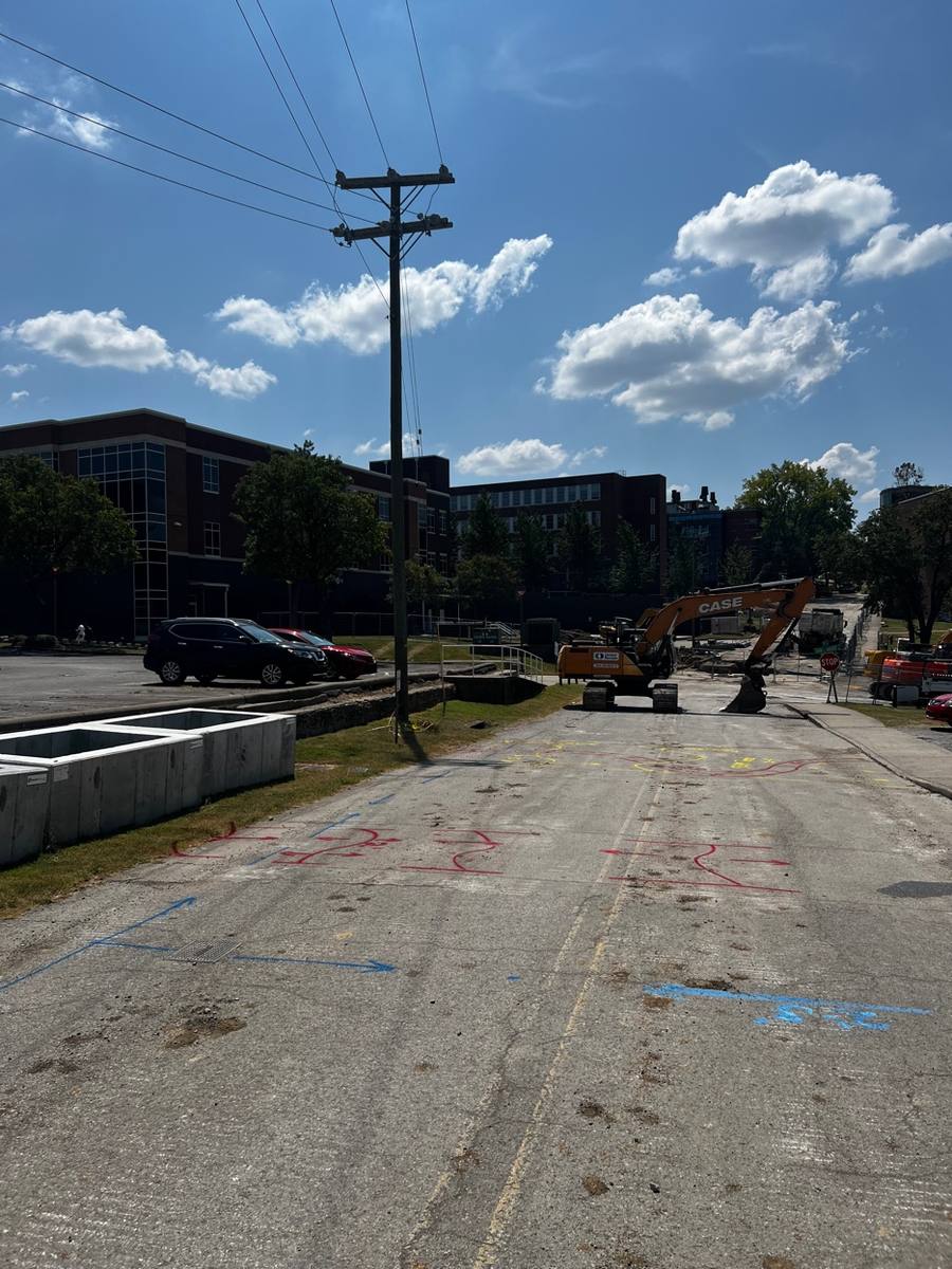 Utility locating with excavator on site - West Nashville